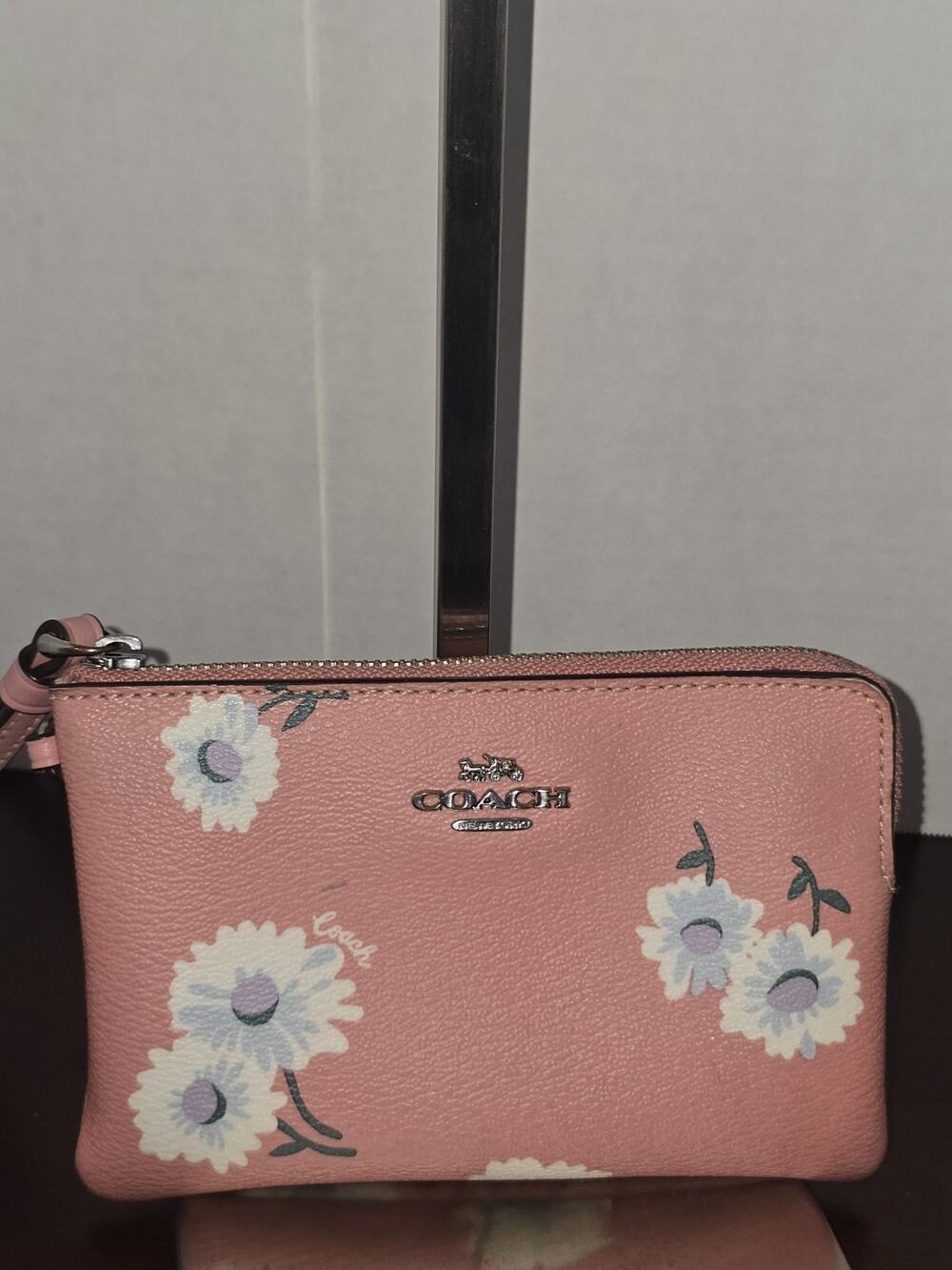 coach pink floral wristlet